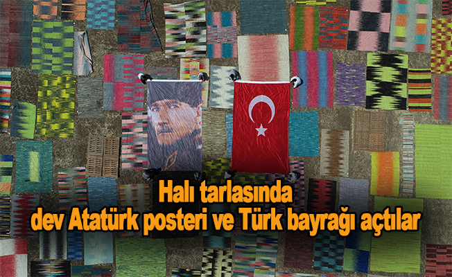 Dev Atatürk posteri ve Türk bayrağı açtılar