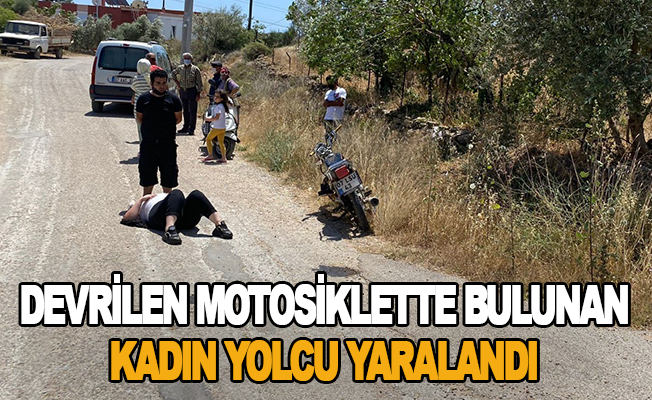 Devrilen motosiklette bulunan kadın yolcu yaralandı